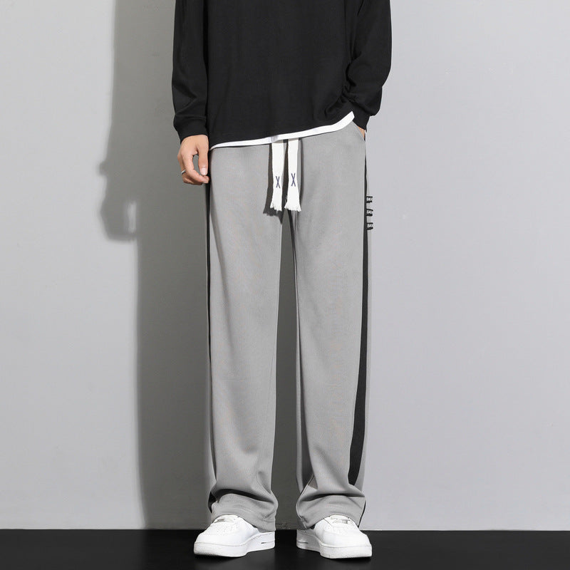 Pantalon décontracté long à rayures et jambes droites et amples