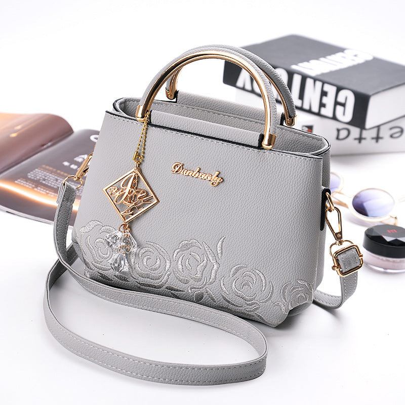 Embroider line embroidery PU handbag is superior direct selling chun xia fashionable new iron wrapped handbag party a undertakes