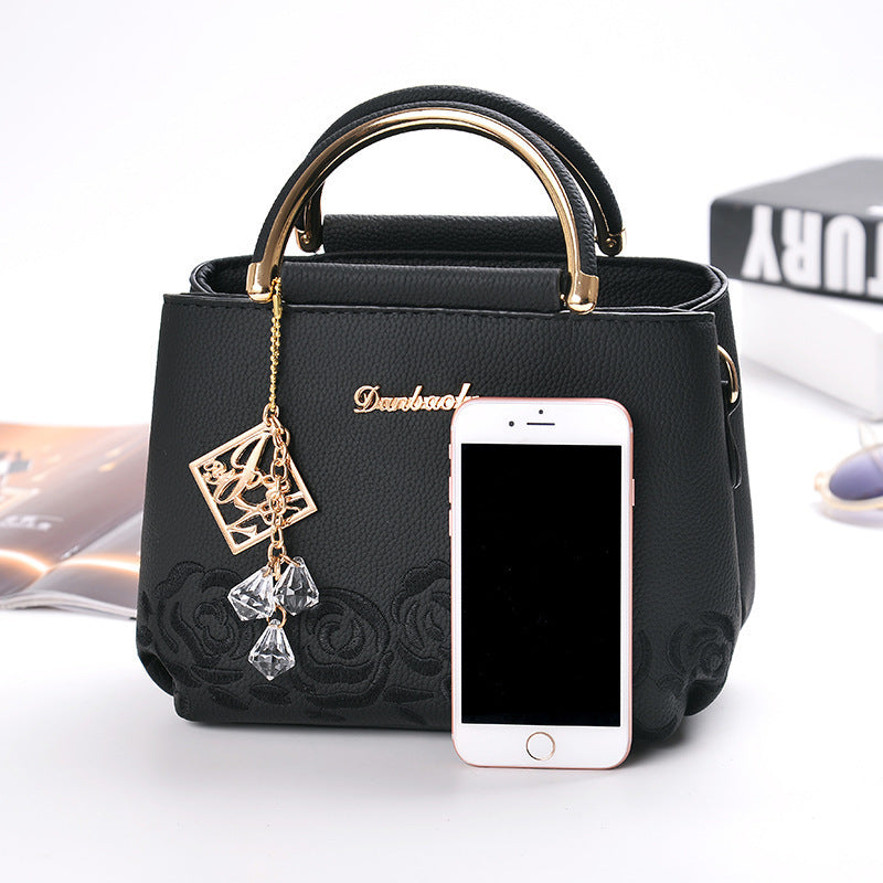 Embroider line embroidery PU handbag is superior direct selling chun xia fashionable new iron wrapped handbag party a undertakes