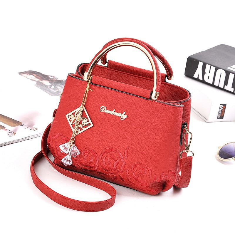 Embroider line embroidery PU handbag is superior direct selling chun xia fashionable new iron wrapped handbag party a undertakes