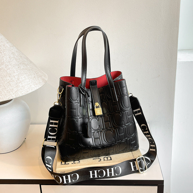 Letter Embossed Solid Color Fashion Retro Classic One-shoulder Portable Commuter Bucket Bag