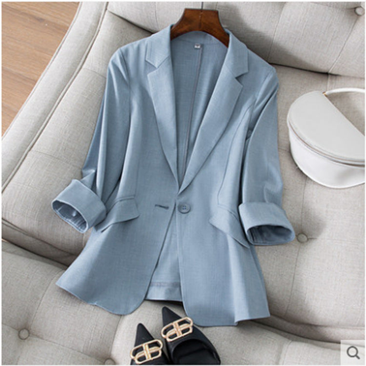 Veste de tailleur femme coupe ajustée avec manches trois-quarts et col de costume