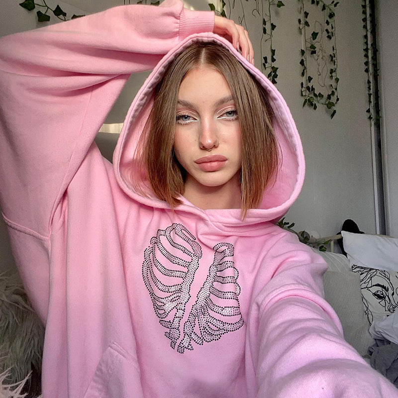 Pull à capuche ample avec strass motif squelette