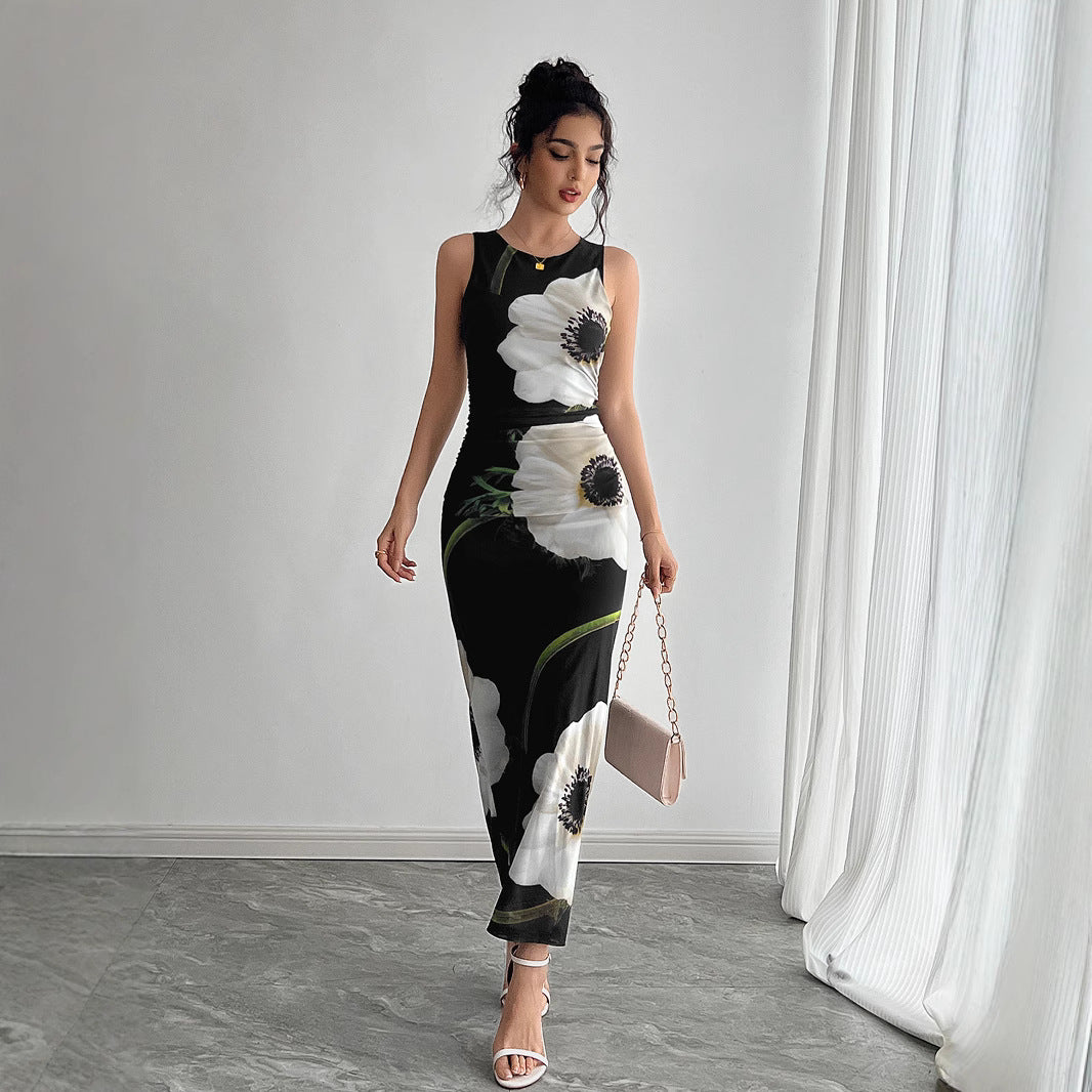 فستان نسائي طويل أسود شبكي بدون أكمام بطبعة زهور