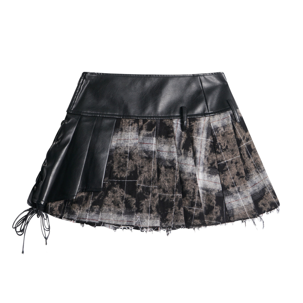 Jupe plissée en nylon noir avec surpiqûres en cuir pour femme