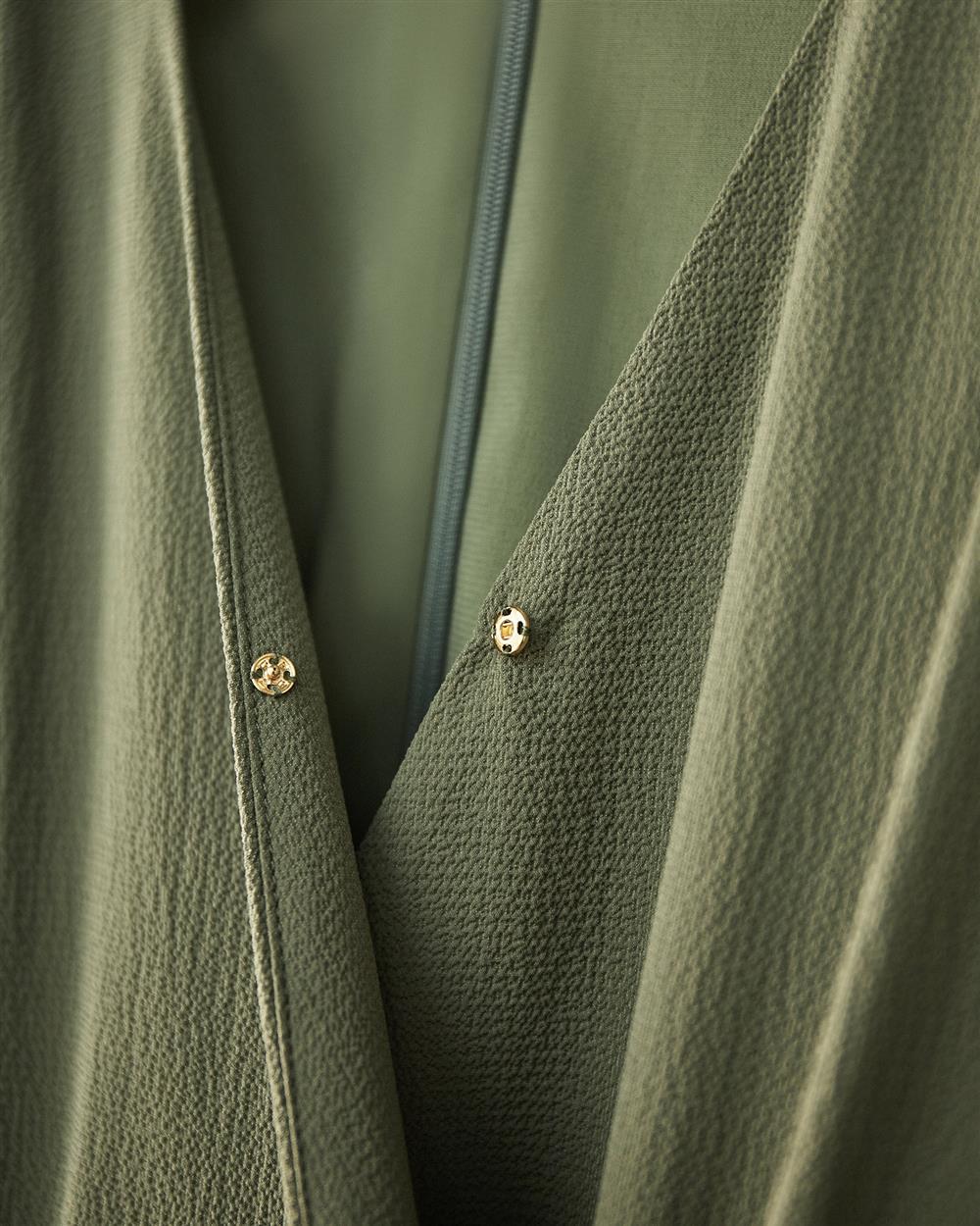 Robe bulle plissée en mousseline verte avec taille plissée et manches longues pour les trajets quotidiens au bureau