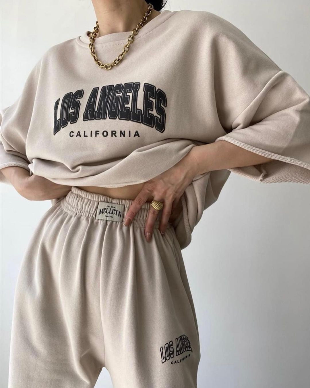 Ensemble deux pièces sweat à capuche imprimé manches courtes et pantalon pour femme