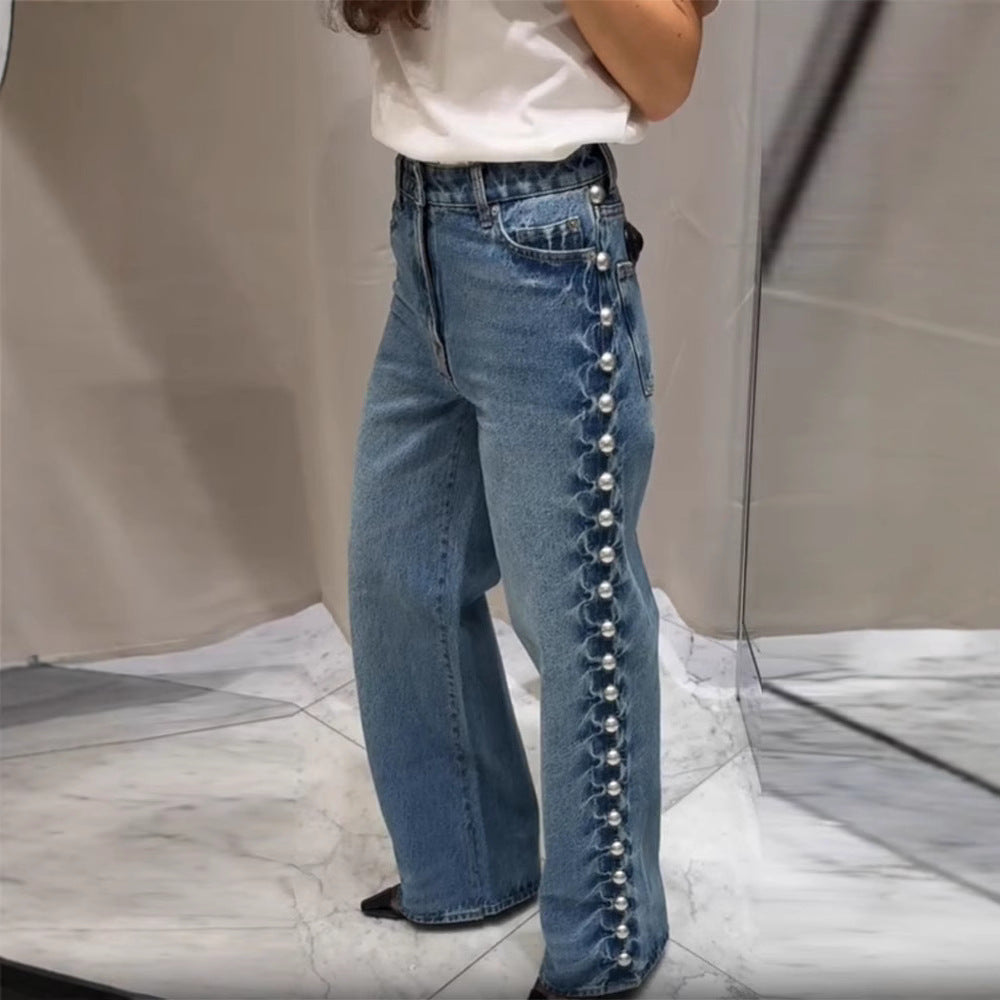 Jeans en jean bleu foncé rétro pour femme avec détails décoratifs de perles rondes sur les côtés