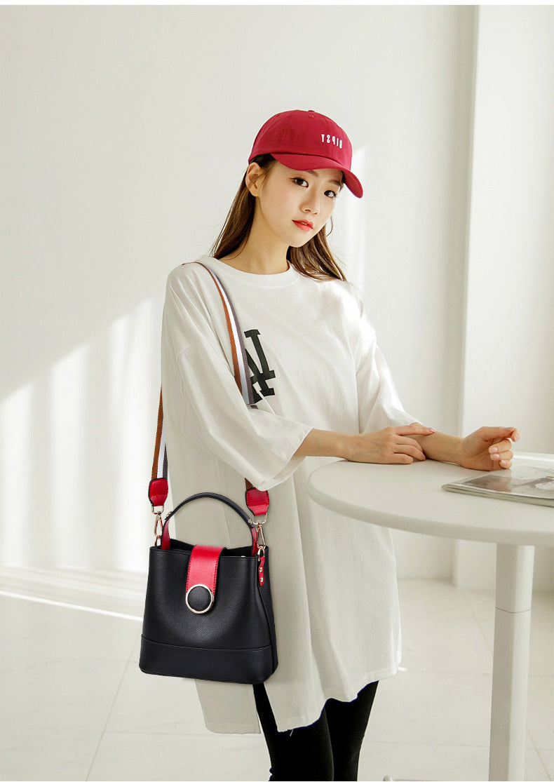 Sac seau femme en PU à bandoulière large et poignée souple