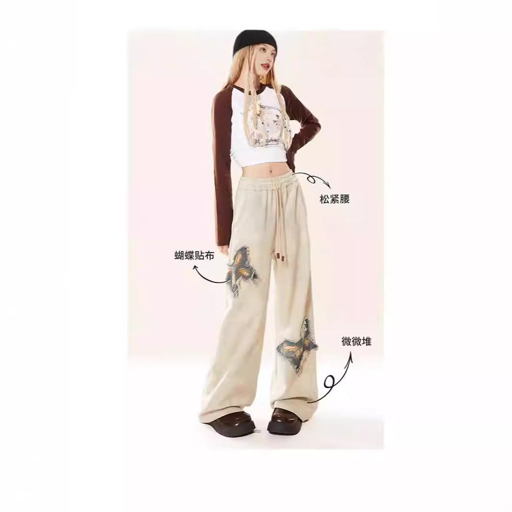 Pantalon en jean évasé abricot brodé papillon américain pour femme