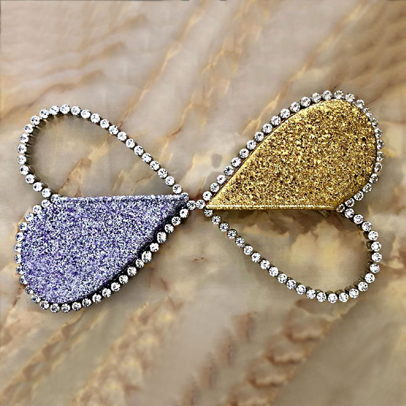 Diamond studded dinner bag with diamond heart-shaped clutch