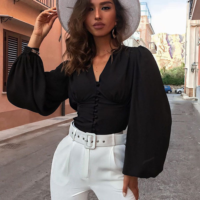 T-shirt uni à col en V, manches longues bouffantes, coupe ajustée, boutonnage