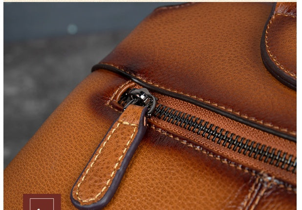 Retro One-Shoulder Cowhide Handbag with Embossed Design