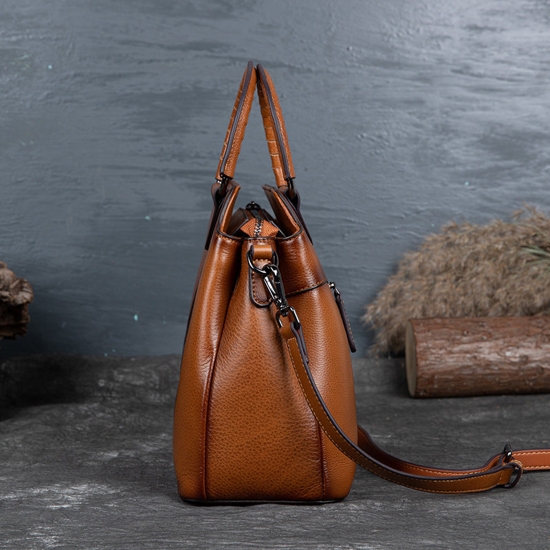 Retro One-Shoulder Cowhide Handbag with Embossed Design