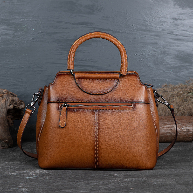 Retro One-Shoulder Cowhide Handbag with Embossed Design