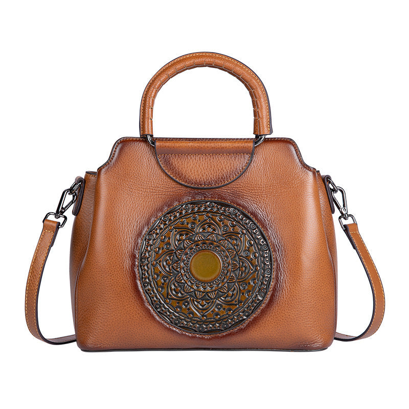 Retro One-Shoulder Cowhide Handbag with Embossed Design