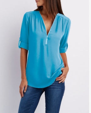 Chemisier ample zippé à col en V et manches courtes pour femme, disponible en plusieurs coloris