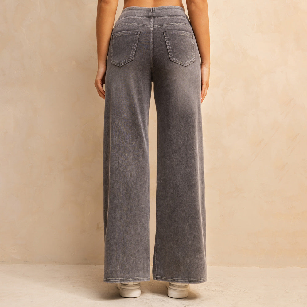 بنطلون جينز نسائي فضفاض بخصر عالٍ ولون رمادي فاتح متوسط