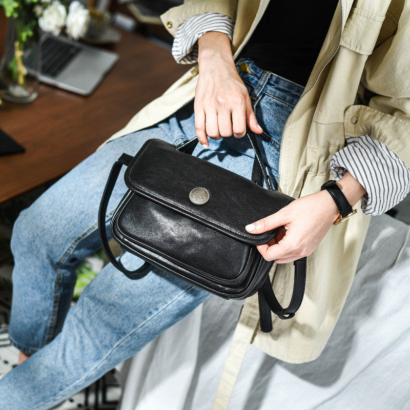 Sac à bandoulière neutre en cuir de vachette avec fermeture éclair