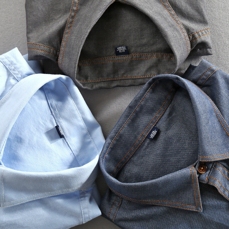 Chemise en jean décontractée ample à manches longues et revers en coton pour homme