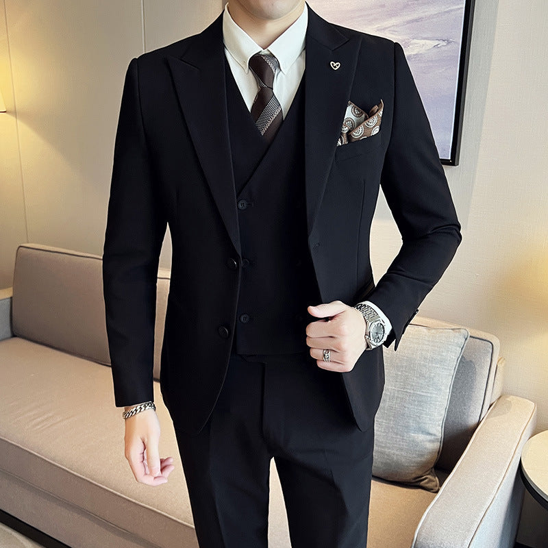 Costume trois pièces coupe slim à double boucle et couleur unie