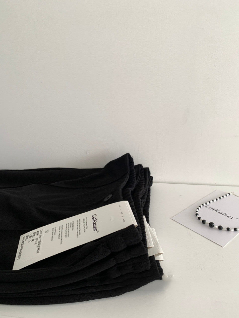 Pantalon décontracté taille haute coupe slim tombant