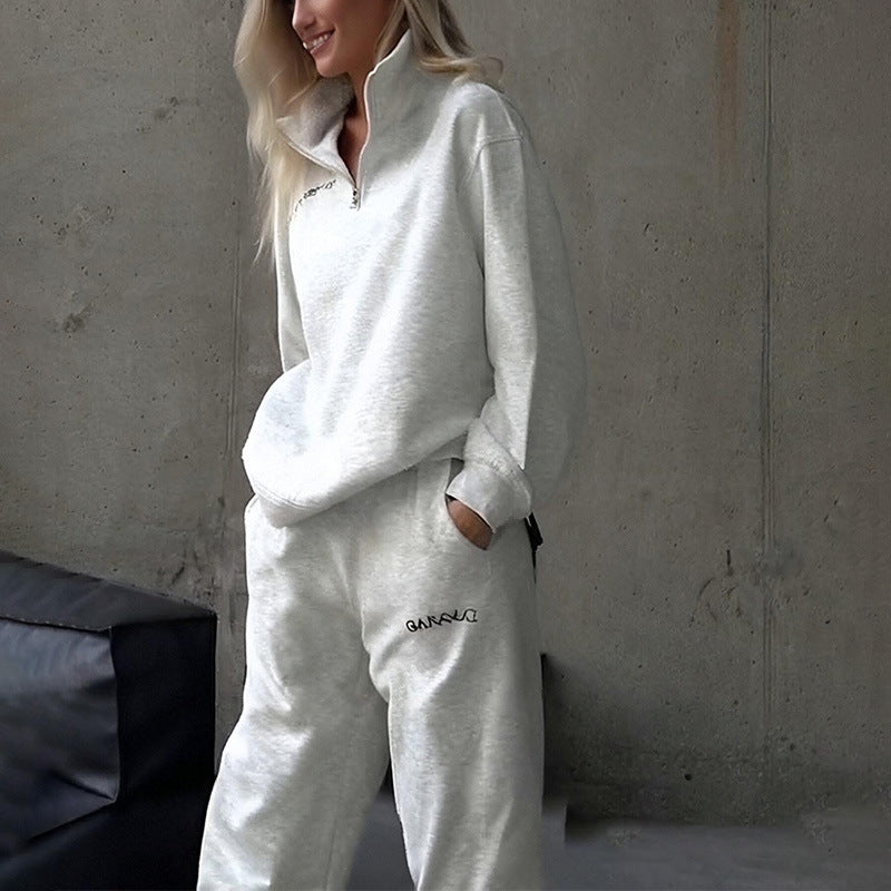 طقم رياضي نسائي كلاسيكي من قطعتين بسحاب أمامي