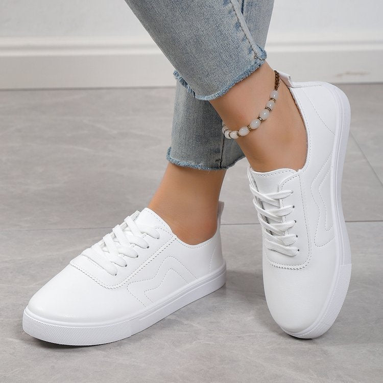 Chaussures plates décontractées à lacets et bout rond blanc