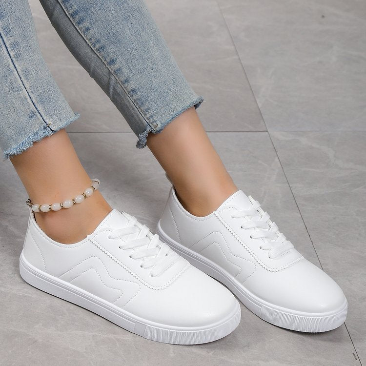 Chaussures plates décontractées à lacets et bout rond blanc