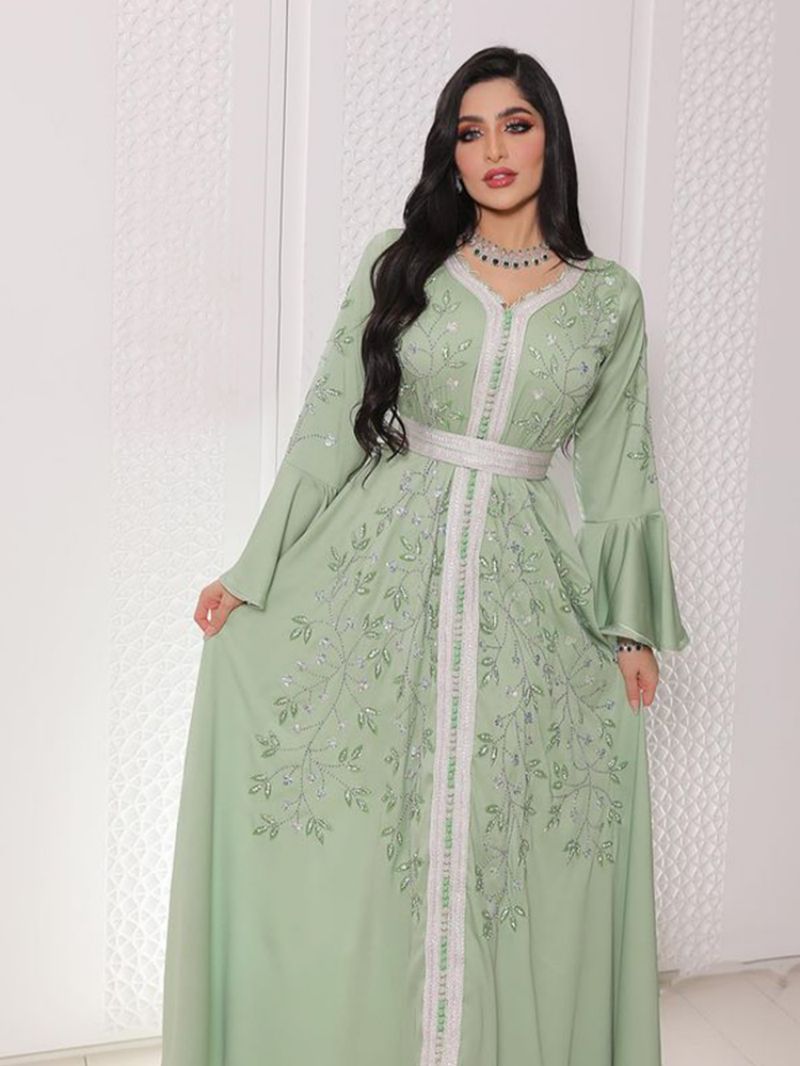 Robe caftan en dentelle vert moyen-oriental avec strass