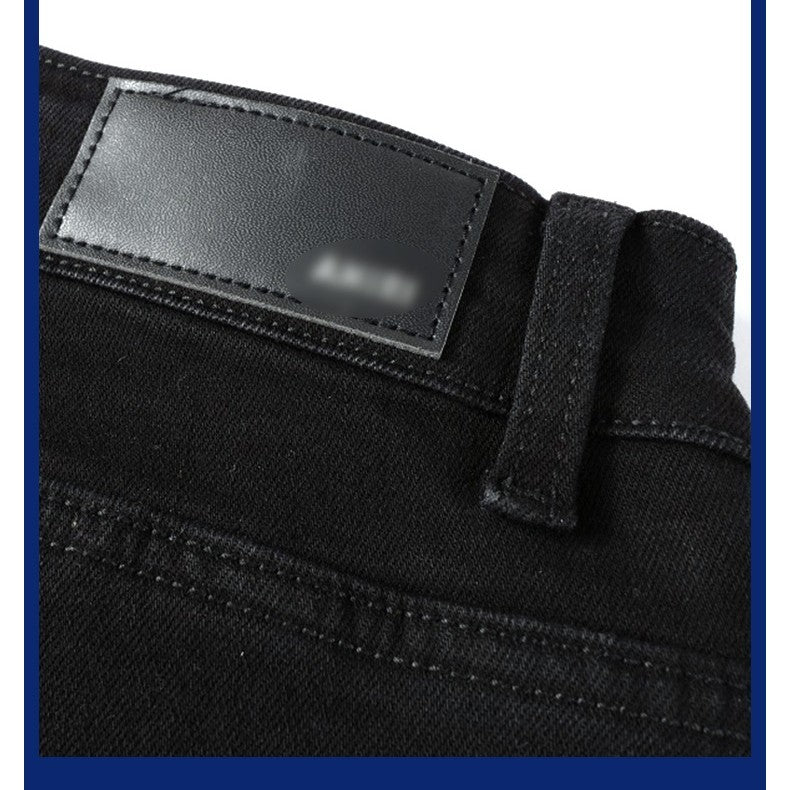 Jean plissé noir avec empiècements pour homme