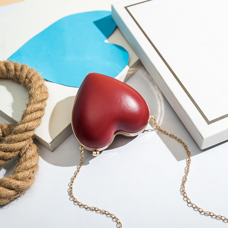 Red Mini Heart-Shaped Shoulder Bag with Chain Lock Closure