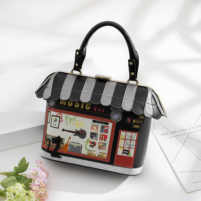Printed small house handbag