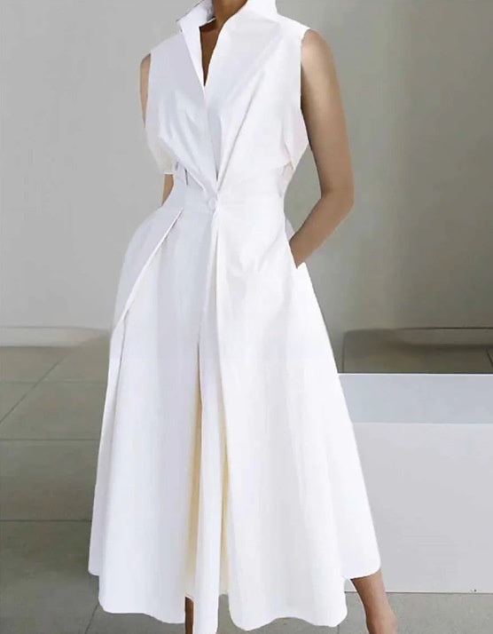 Robe mi-longue en coton à col montant, taille cintrée et imprimé poche