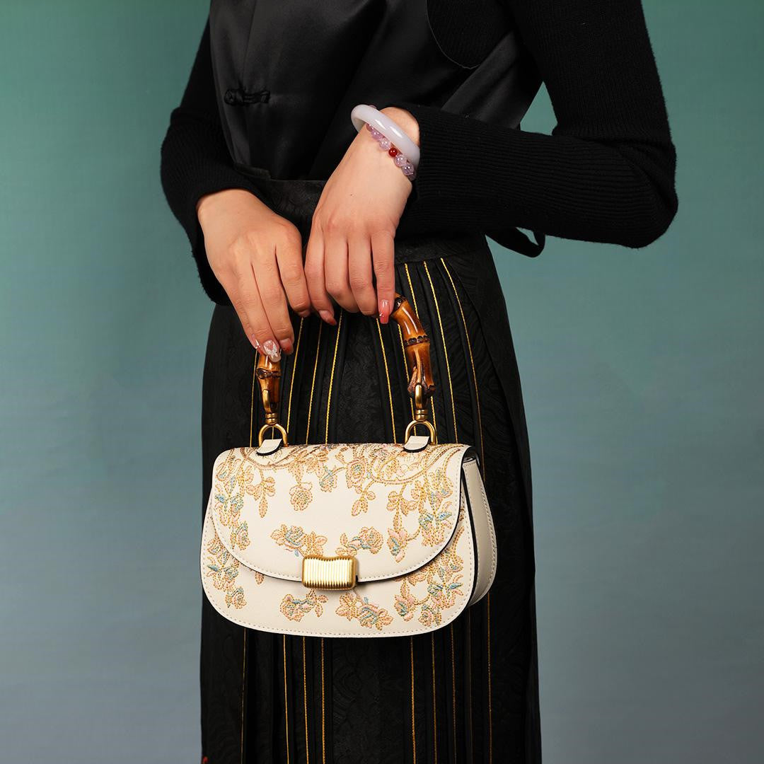 Cowhide Embroidered Bamboo Handle Ladies Handbag