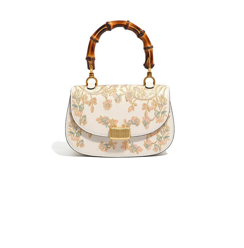 Cowhide Embroidered Bamboo Handle Ladies Handbag