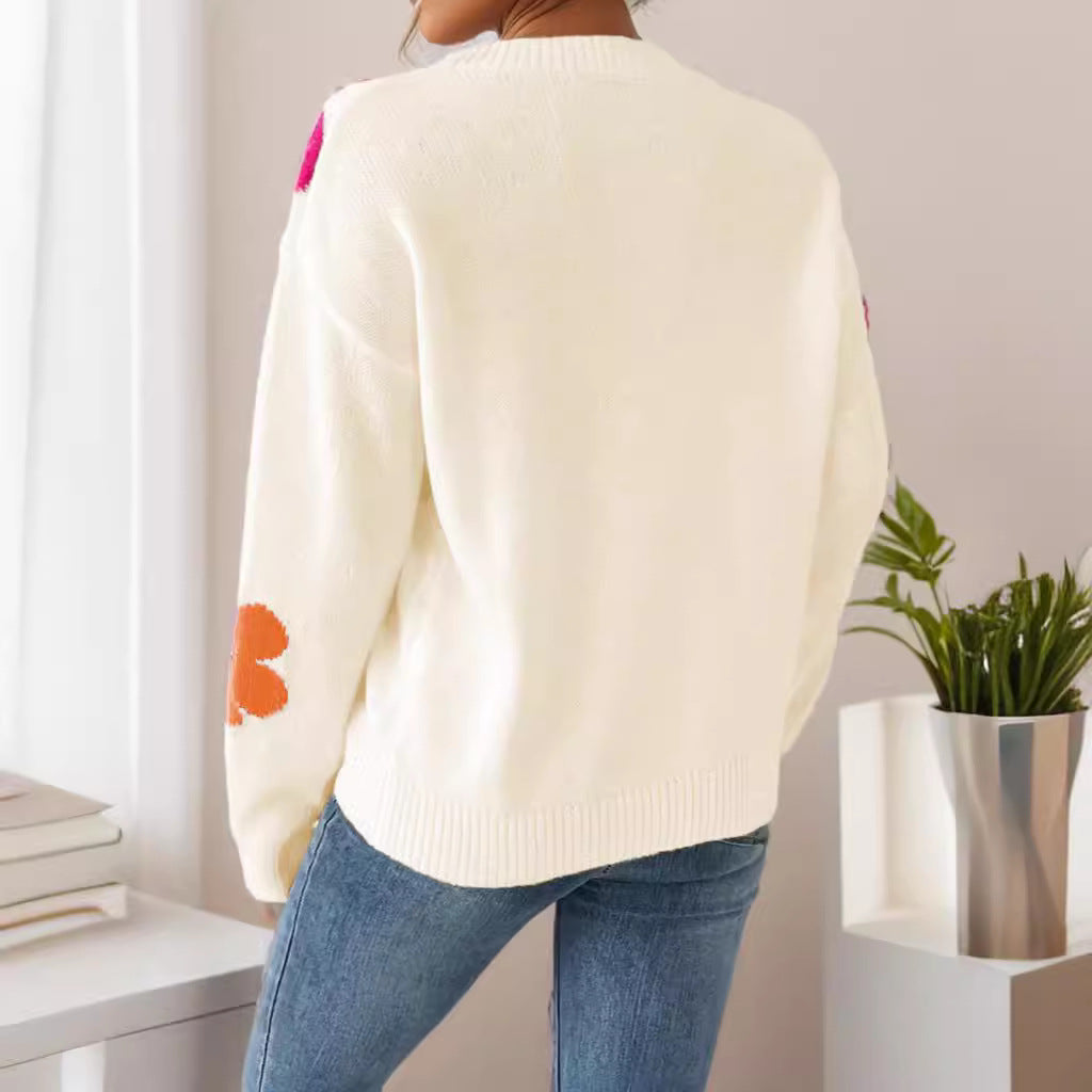 Haut en maille à manches longues et col en V motif floral abricot pour femme