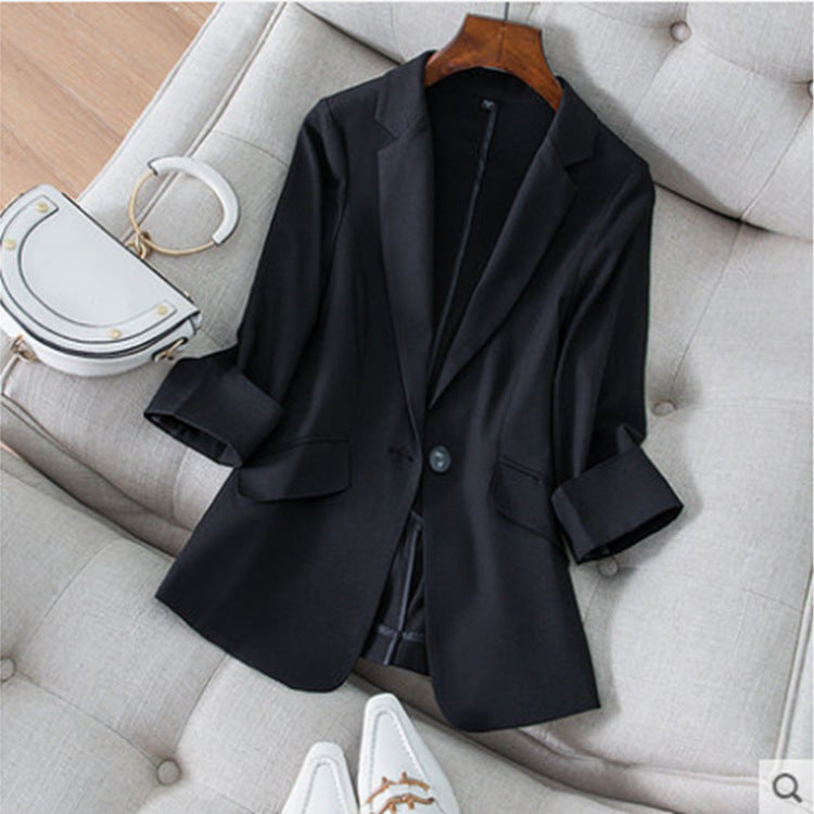 Veste de tailleur femme coupe ajustée avec manches trois-quarts et col de costume