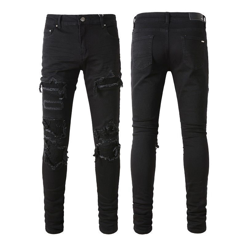 Jean plissé noir avec empiècements pour homme