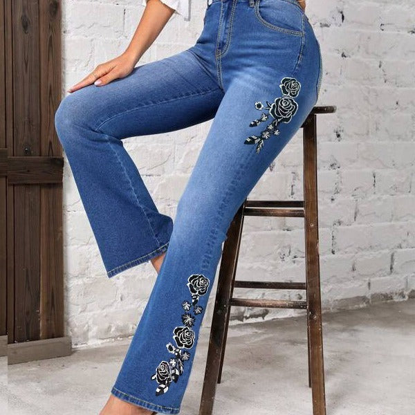 Jean évasé stretch à broderies florales pour femme