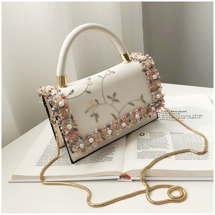 Single shoulder straddle portable small square bag