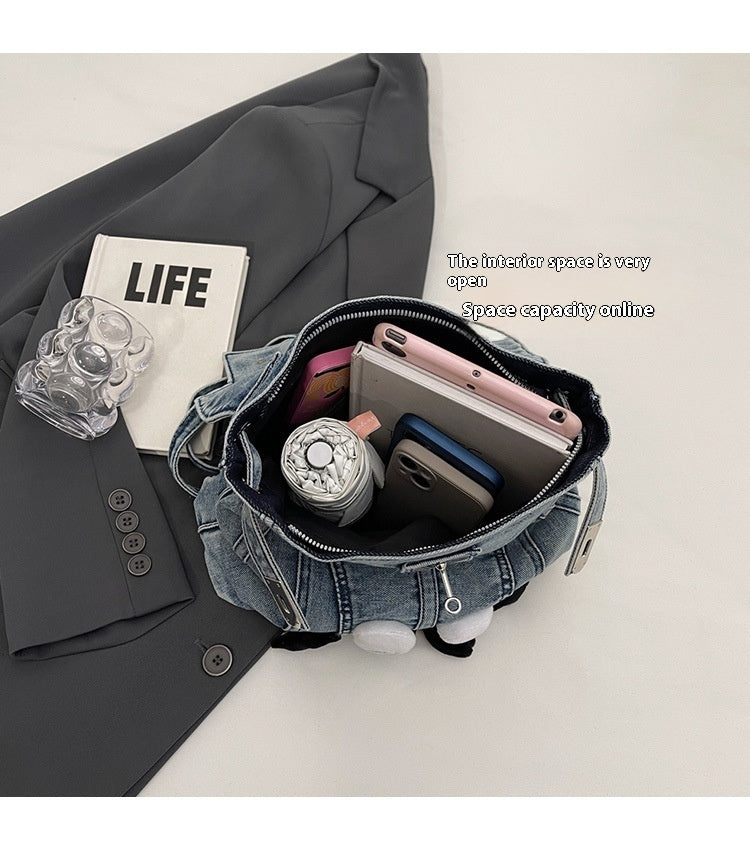 Sac à dos en jean délavé style rétro avec design à la simplicité urbaine