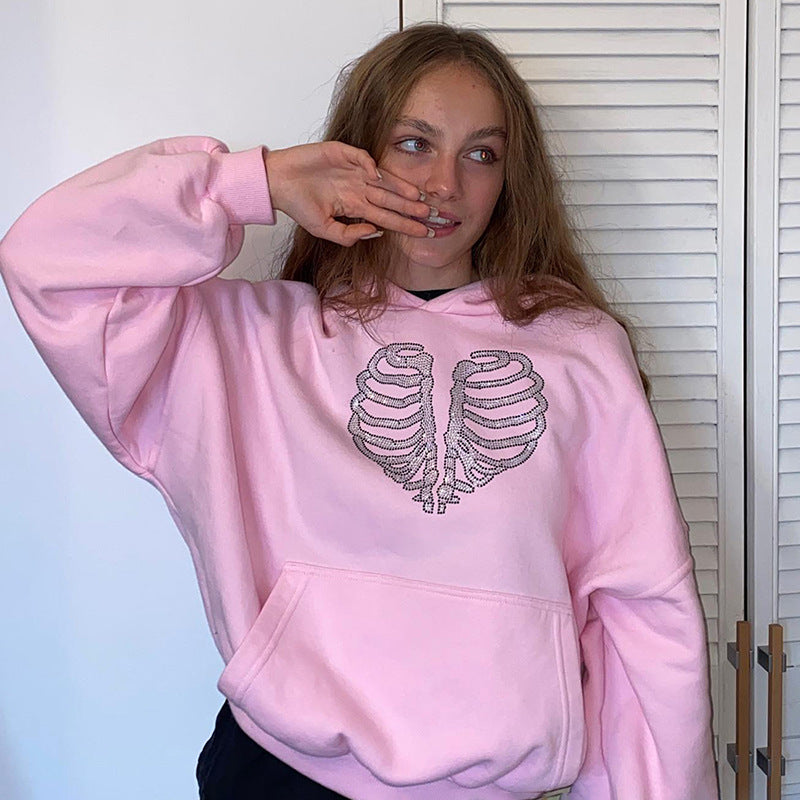 Pull à capuche ample avec strass motif squelette
