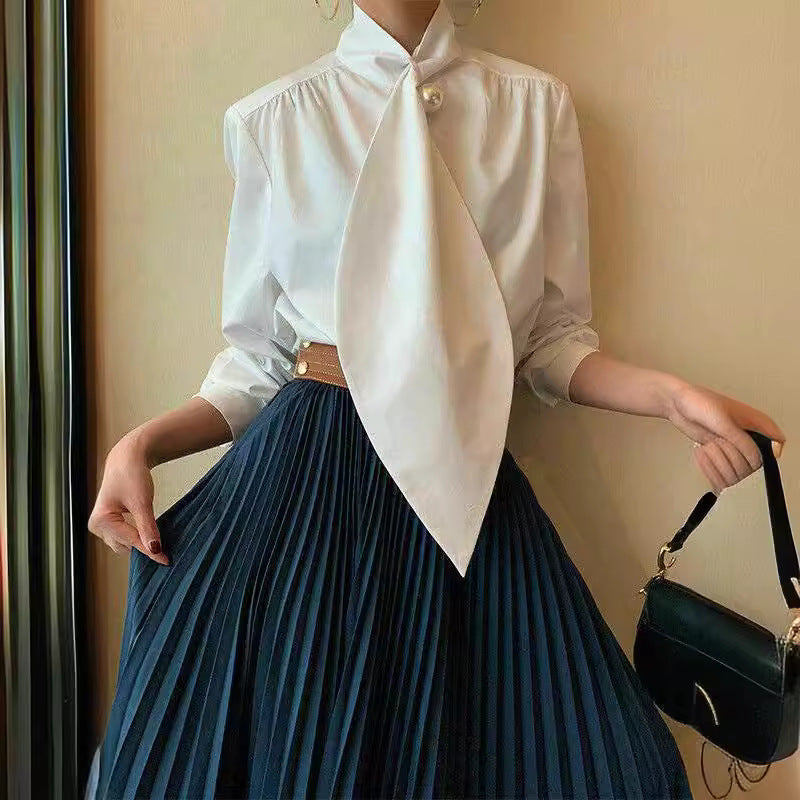 Haut chemise ample à revers et manches longues pour femmes, disponible en blanc, noir et bleu