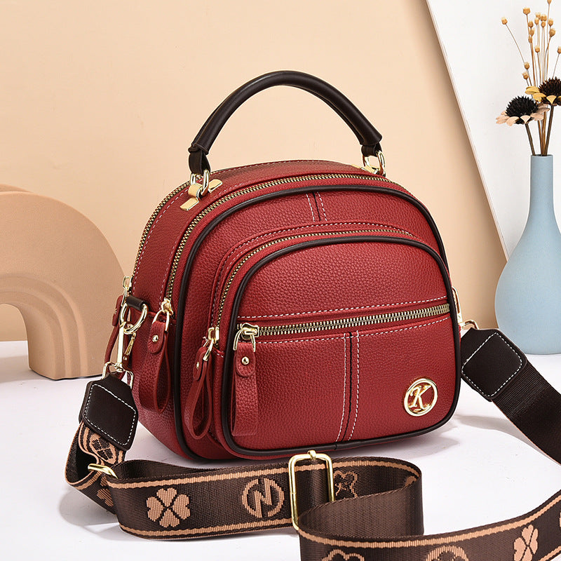 Sac bandoulière carré polyvalent pour femme avec plusieurs fermetures éclair et une bandoulière