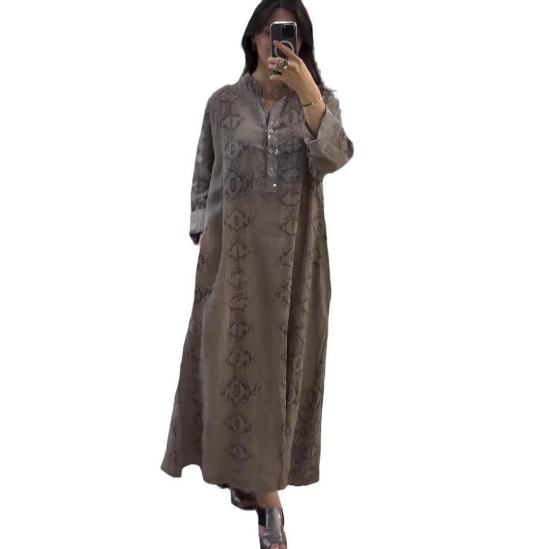 فستان نسائي أنيق بأكمام طويلة ومزيّن بالترقيع