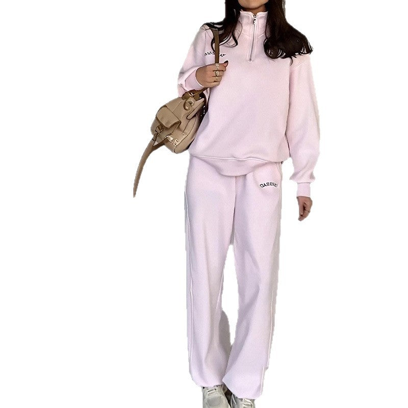 طقم رياضي نسائي كلاسيكي من قطعتين بسحاب أمامي