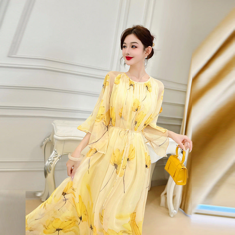 Robe en mousseline française fluide et polyvalente à motif floral jaune pour femme