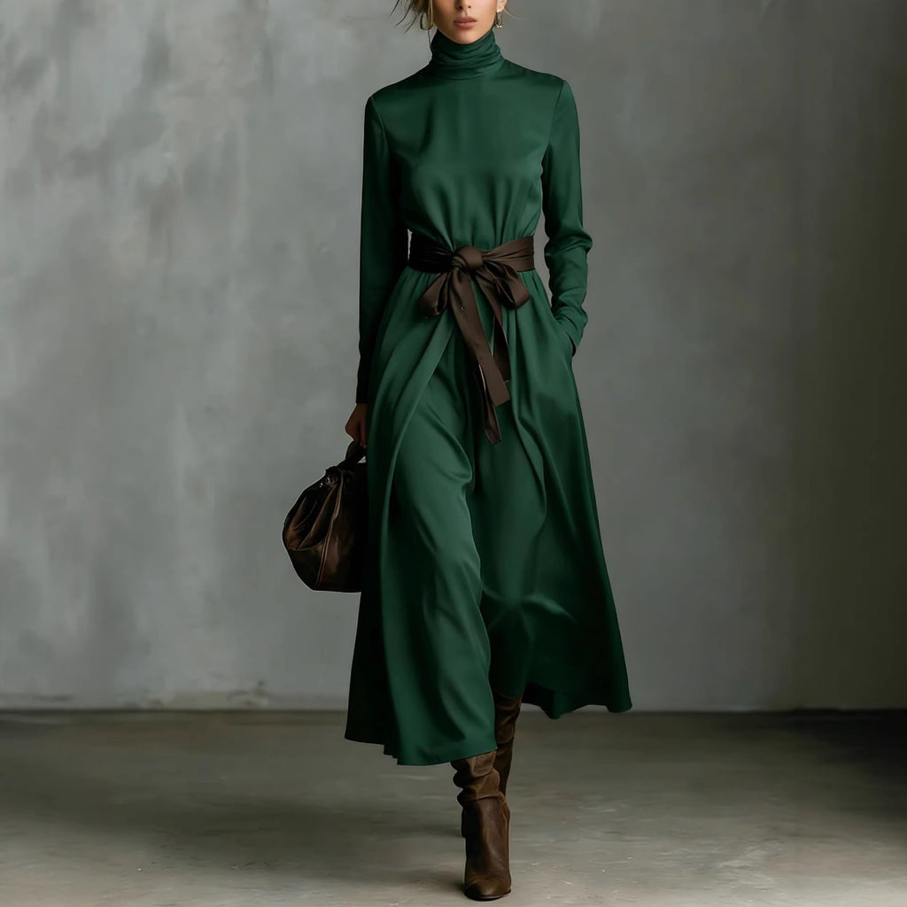 Élégante robe mi-longue à manches longues avec ceinture contrastante