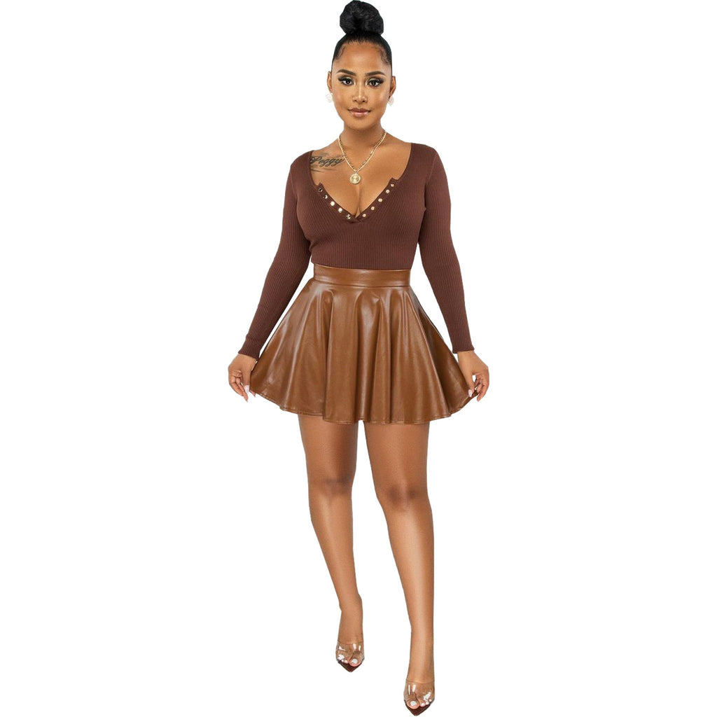 Jupe plissée sexy pour femme en similicuir PU de couleur unie